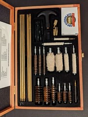 Barely Used Gunmaster Model # UGC 76W Universal Cleaning Kit in wood box