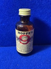 1961 HOPPE’S POWDER SOLVENT NO. 9 MARK PREVENTS RUST ON GUNS BROWN BOTTLE