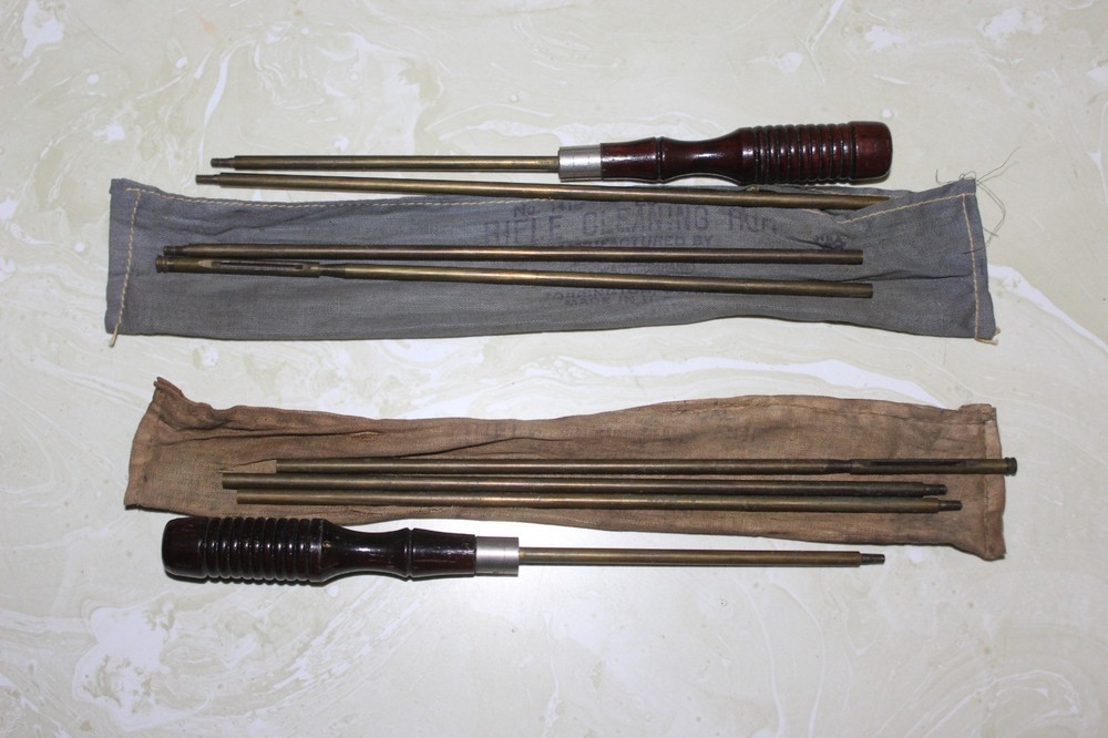 AS FOUND, PAIR OF WOODEN HANDLE BRASS RIFLE CLEANING RODS WITH CLOTH BAGS 34″