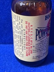 1961 HOPPE’S POWDER SOLVENT NO. 9 MARK PREVENTS RUST ON GUNS BROWN BOTTLE