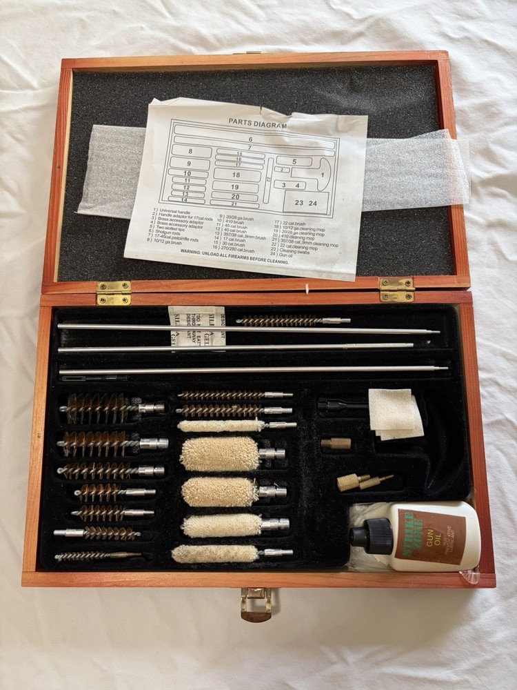 Barely Used Gunmaster Model # UGC 76W Universal Cleaning Kit in wood box
