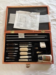 Barely Used Gunmaster Model # UGC 76W Universal Cleaning Kit in wood box