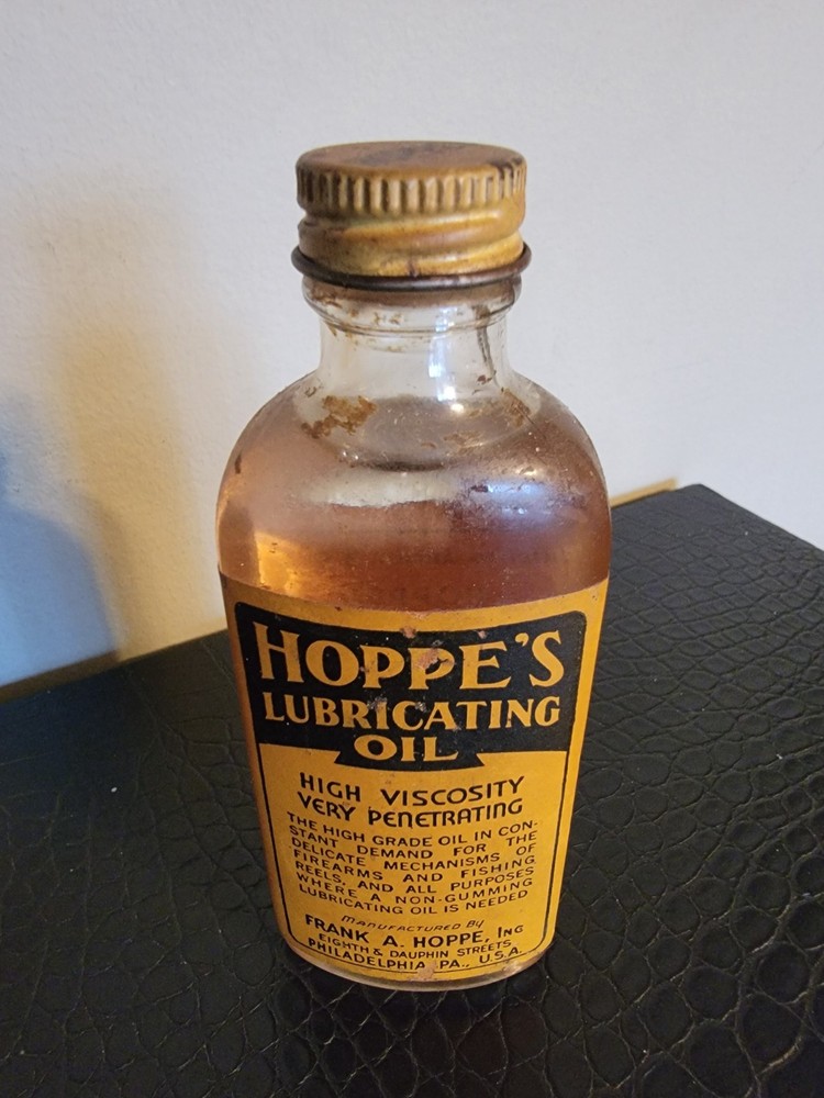 HOPPE’S Vintage glass bottle of Lubricating Oil. New never opened