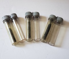 Lot Of 12 Military Metal Plastic Oil Bottles some have bore brushes