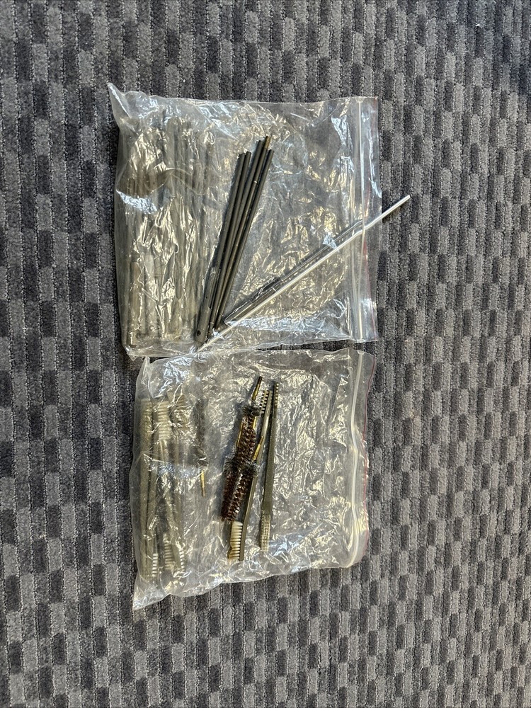 Various Cleaning Rods And Brushes