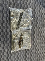 Various Cleaning Rods And Brushes