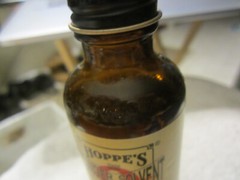 # 9 ad Hoppe’s No. 9 Nitro Powder Solvent 2 oz Bottle W/ Box,90% full VTG