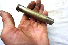 VINTAGE MARBLES NO 99 PISTOL CLEANING KIT IN METAL STORAGE TUBE