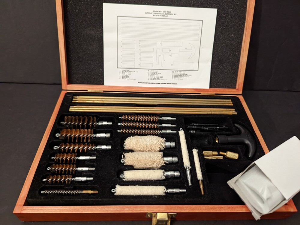 Barely Used Gunmaster Model # UGC 76W Universal Cleaning Kit in wood box