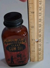Vintage GUN SLICK Empty Clear GUN OIL Bottle.