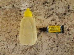 Vintage Full Brite Bore Gun Oil Bottle and Used Tube of Molykote Gun & Reel Lube