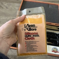 Pre-Owned DAC Gunmaster Deluxe Universal Gun Cleaning Kit with red wooden Case.