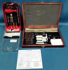 Pair Of Gun Cleaning Kits In Boxes Two Brands Mixed Storage Cases