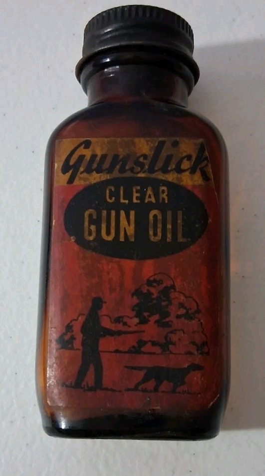 Vintage GUN SLICK Empty Clear GUN OIL Bottle.