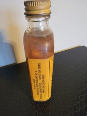 HOPPE’S Vintage glass bottle of Lubricating Oil. New never opened