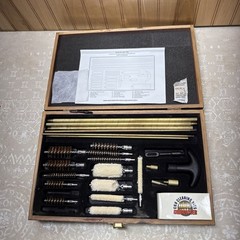 Barely Used Gunmaster Model # UGC 76W Universal Cleaning Kit in wood box