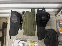 Lot of Bulldog Gun Holsters, Laser Boresighter, Savage Lock W/ Keys, Boresnake