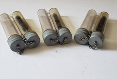 Lot Of 12 Military Metal Plastic Oil Bottles some have bore brushes