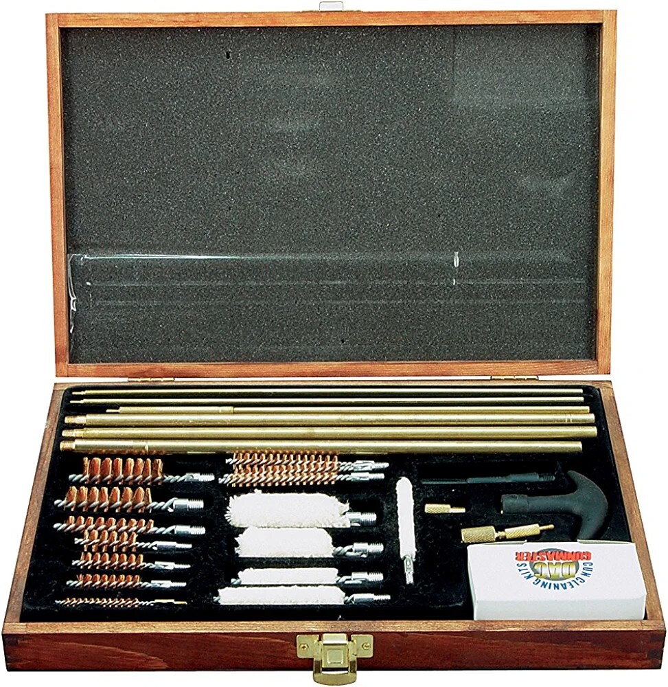 Pre-Owned DAC Gunmaster Deluxe Universal Gun Cleaning Kit with red wooden Case.