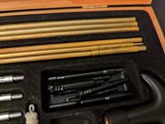 Barely Used Gunmaster Model # UGC 76W Universal Cleaning Kit in wood box