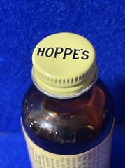 1961 HOPPE’S POWDER SOLVENT NO. 9 MARK PREVENTS RUST ON GUNS BROWN BOTTLE
