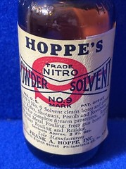 1961 HOPPE’S POWDER SOLVENT NO. 9 MARK PREVENTS RUST ON GUNS BROWN BOTTLE