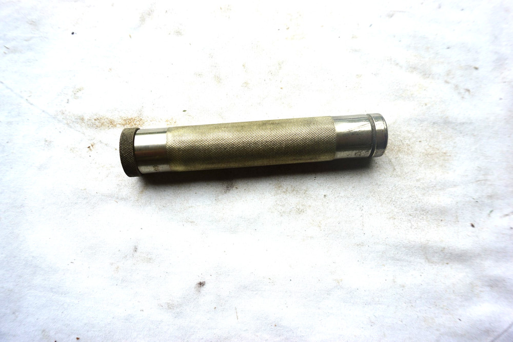 VINTAGE MARBLES NO 99 PISTOL CLEANING KIT IN METAL STORAGE TUBE