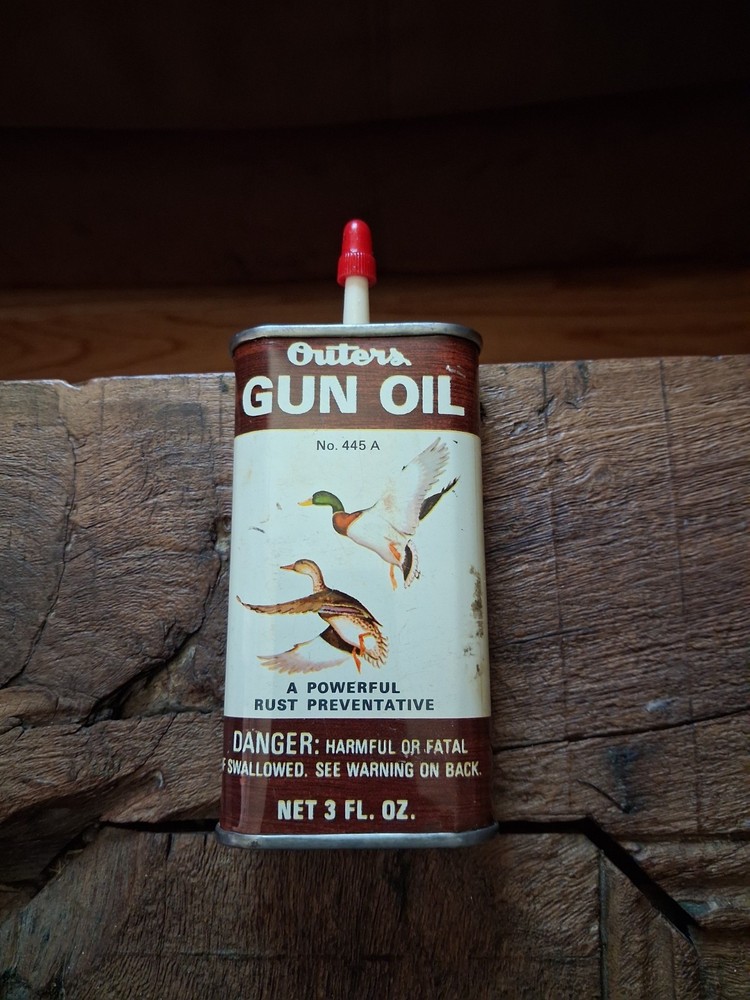 outers gun oil tin with ducks