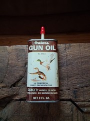 outers gun oil tin with ducks