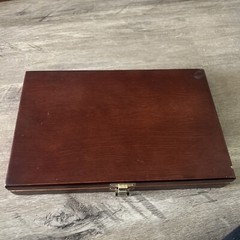 Pre-Owned DAC Gunmaster Deluxe Universal Gun Cleaning Kit with red wooden Case.