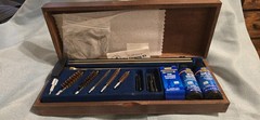 Outers Deluxe Gun Cleaning Kit w/ Wood Case, Solvent, Oil, Patches, .22/.30/.38
